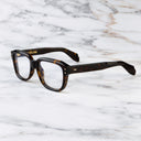 An image of the 1433 Square Optical in Dark Havana frame side view with arms open marble background