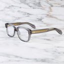 An image of the 1433 Square Optical in Smoke Quartz frame side view with arms open marble background
