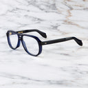 An image of the 9782 Aviator Optical in Classic Navy Blue frame side view with arms open marble background