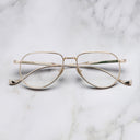 An image of the Pembroke 1429 Aviator Opticals in Gold frame frontal view with arms closed marble background