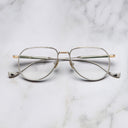 An image of the Pembroke 1429 Aviator Opticals in Silver/Gold frame frontal view with arms closed marble background