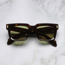 An image of the 9386 Square Sunglasses in Dark Havana frame frontal view with arms closed marble background
