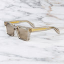 An image of the 9386 Square Sunglasses in Sand Crystal frame side view with arms open marble background