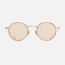 An image of the Cutler and Gross Brompton 1438 in Pink Gold/White Horn frame front view with arms open in white background.