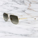 An image of the Sloane 1423 Aviator Sunglasses in Silver/Gold frame side view with arms open marble background