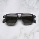 An image of the GR15 Aviator Sunglasses in Dark Grey frame frontal view with arms closed marble background