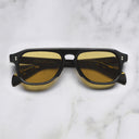An image of the GR14 Aviator Sunglasses in Black frame frontal view with arms closed marble background