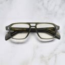 An image of the GR15 Aviator Opticals in Multi Olive frame frontal view with arms closed marble background