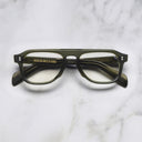 An image of the GR14 Aviator Opticals in Multi Olive frame frontal view with arms closed marble background 
