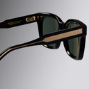 An image of the Breitling Limited-Edition Marisol 0005 Square Sunglasses in 18K Red Gold-plated frame detail close up from the view of the right hand side arm.