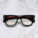 An image of the The Great Frog Lucky Diamond II Rectangle Optical Glasses in Black frame frontal view with arms closed marble background