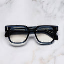 An image of the The Great Frog Lucky Diamond II Rectangle Optical Glasses in Deep Blue frame frontal view with arms closed marble background 