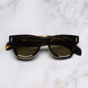 An image of the The Great Frog Phantom Square Sunglasses in Brush Stroke Havana frame frontal view with arms closed marble background 