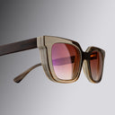 A clickable hero image featuring Buffalo Horn sunglasses in brown with red lenses  and  Shop all button in the bottom left corner, all linking directly to Buffalo Horn collection page. 
