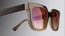 A clickable hero image featuring Buffalo Horn sunglasses in brown with red lenses  and  Shop all button in the bottom left corner, all linking directly to Buffalo Horn collection page. 