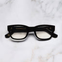 An image of the 0868 Kingsman Optical Square Glasses in Black frame frontal view with arms closed marble background 